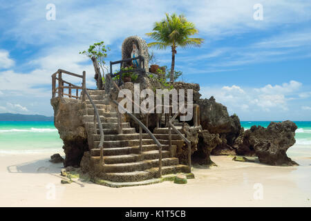 Willy`s Rock on the famous White Beach is one of the most recognizable landmarks of Boracay Island, Philippines Stock Photo